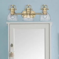 Duncan 24.5 in. 3-Light Brushed Champagne Bronze Vanity Light with Clear Glass Shades by Golden Lighting 11 Duncan 24.5 in. 3-Light Brushed Champagne Bronze Vanity Light with Clear Glass Shades by Golden Lighting -Golden Lighting Shop brushed champagne bronze golden lighting vanity lighting 3602 ba3 bcb clr 44 1000