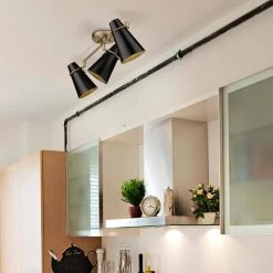 Reeva 29.125 in. 3-Light Modern Brass Semi-Flush Mount by Golden Lighting -Golden Lighting Shop modern brass golden lighting flush mount lights 21223sfmbsblk 1f 1000